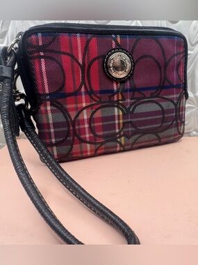 Coach pink purple plaid like emblem pattern wristlet